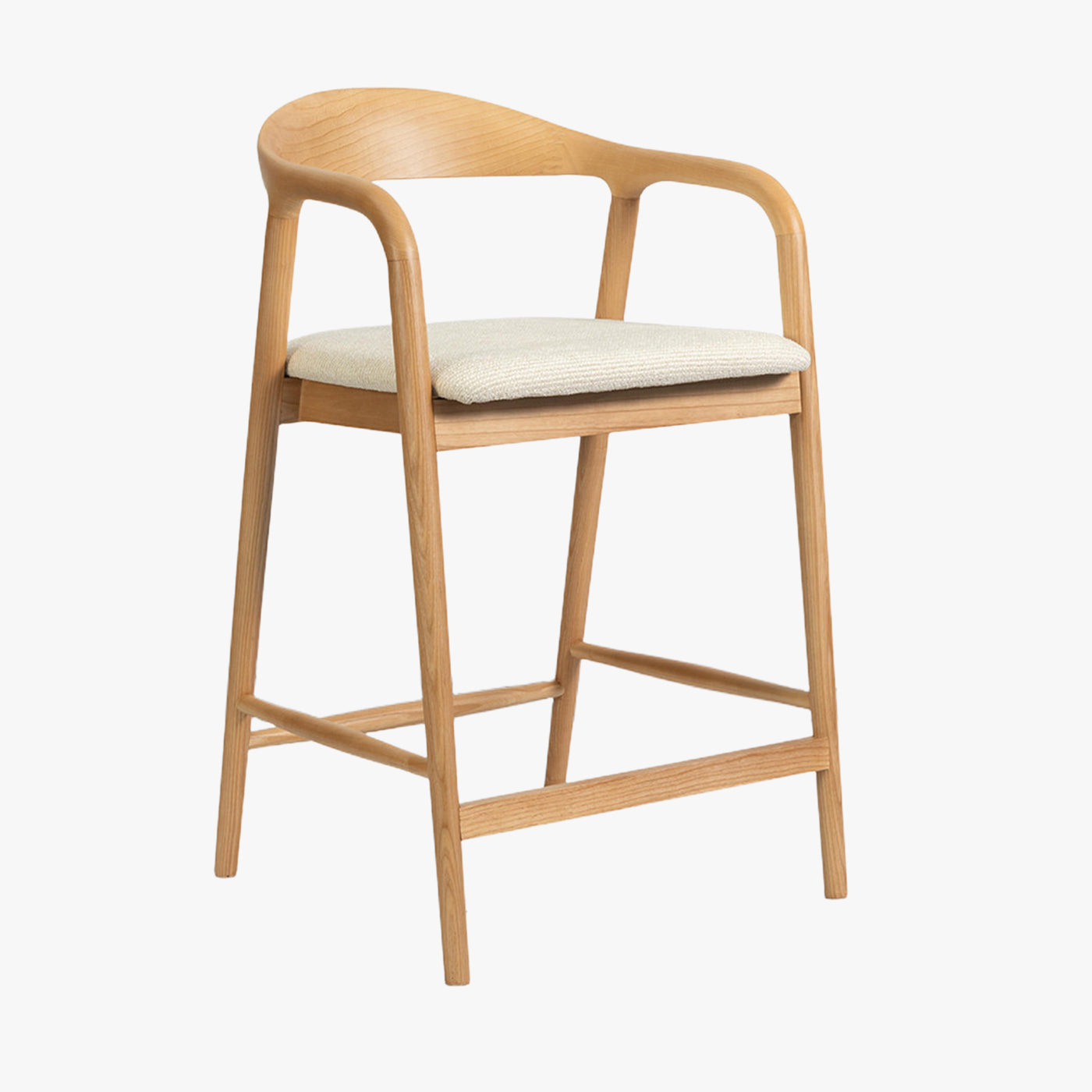 tabouret en tissu beige avec piètement en bois clair