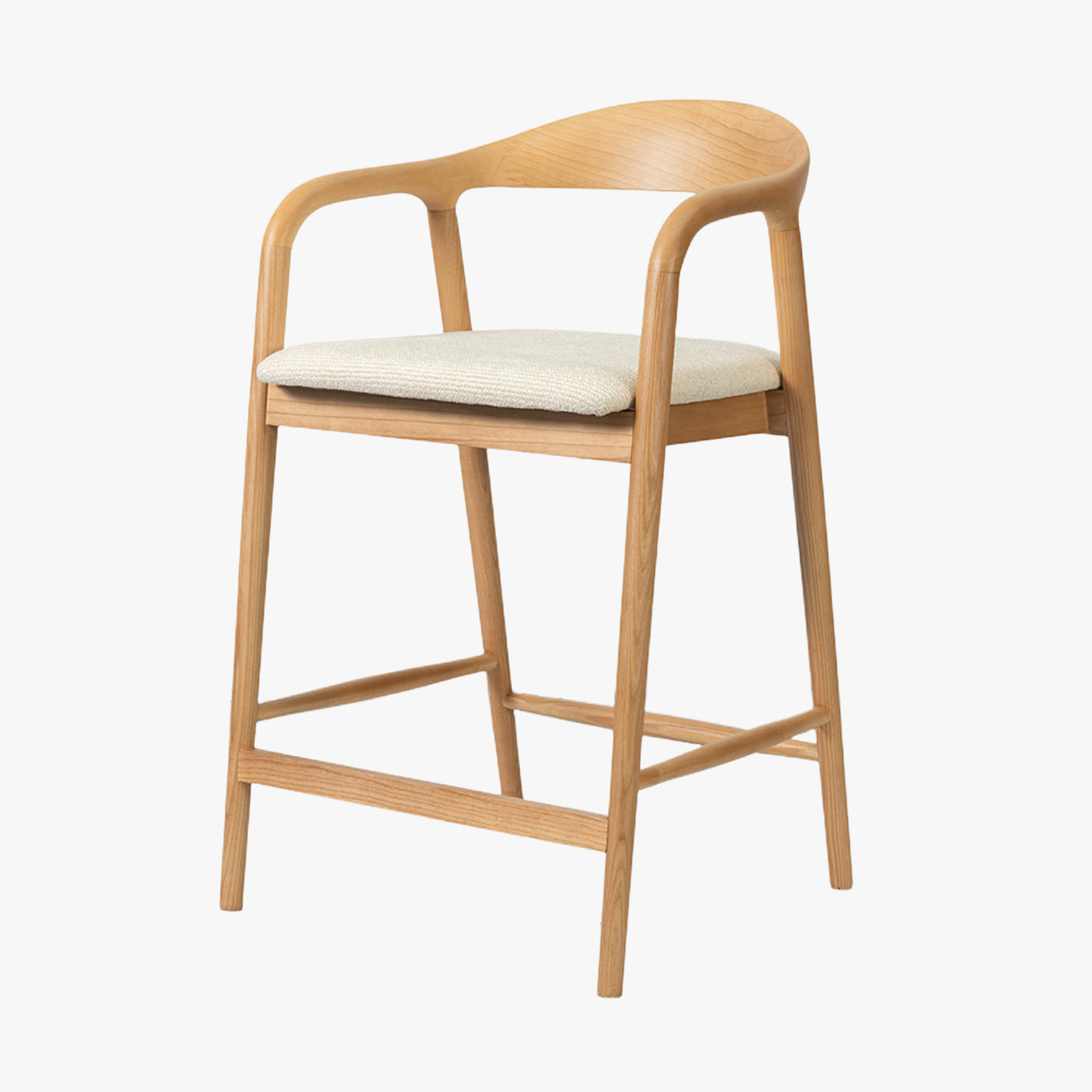 tabouret en tissu beige avec piètement en bois clair