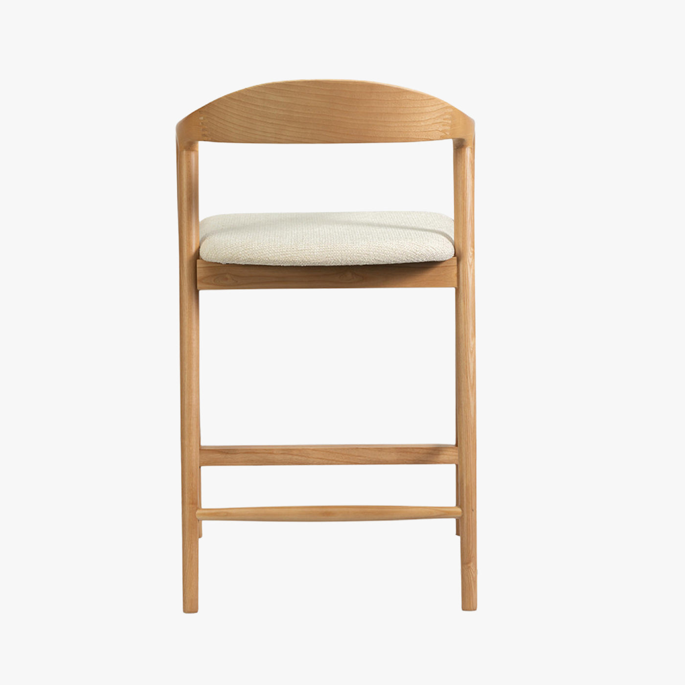 tabouret en tissu beige avec piètement en bois clair